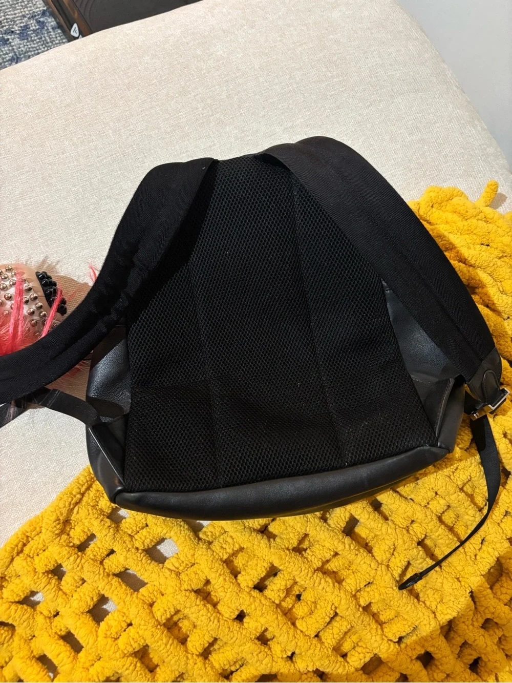 Fendi Black Backpack with Yellow Fur Eye Accents